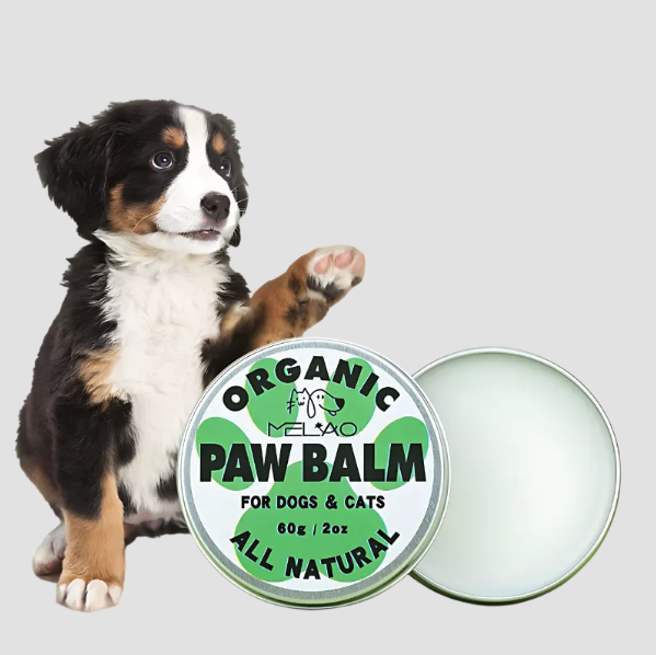 Boîte en métal verte et blanche de baume biologique et 100% naturel pour les coussinets des pattes des chiens et des chats, 60 g, pour apaiser et protéger les pattes de votre animal.